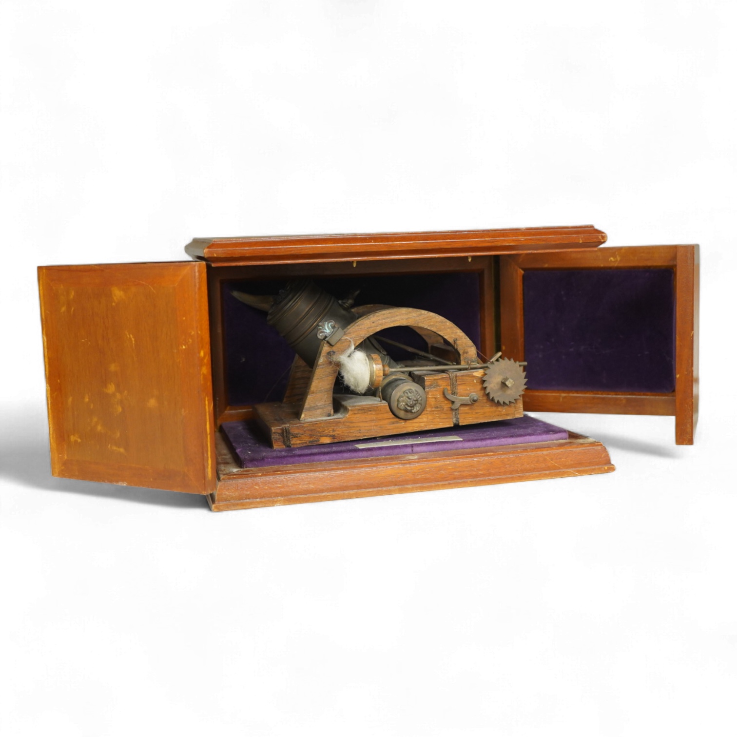 A teak cased presentation model of a bombarda mortar cannon in an oak frame, presented to Admiral Sir Michael Pollock from the Chief of Staff of the Italian Navy, with applied plaque to the lid engraved; ‘To Admiral Sir